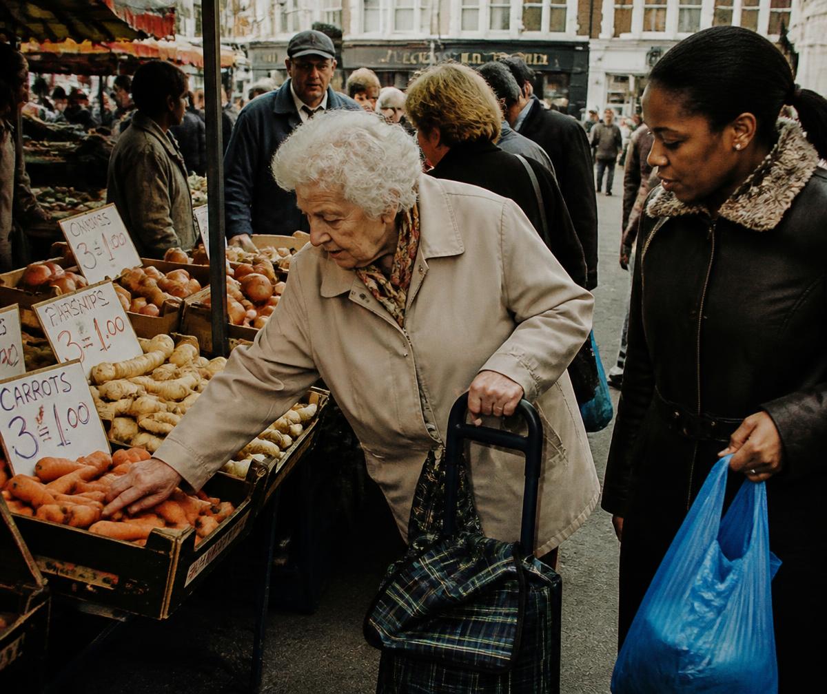 A SAATH companion accompanying an older woman on a local shopping trip